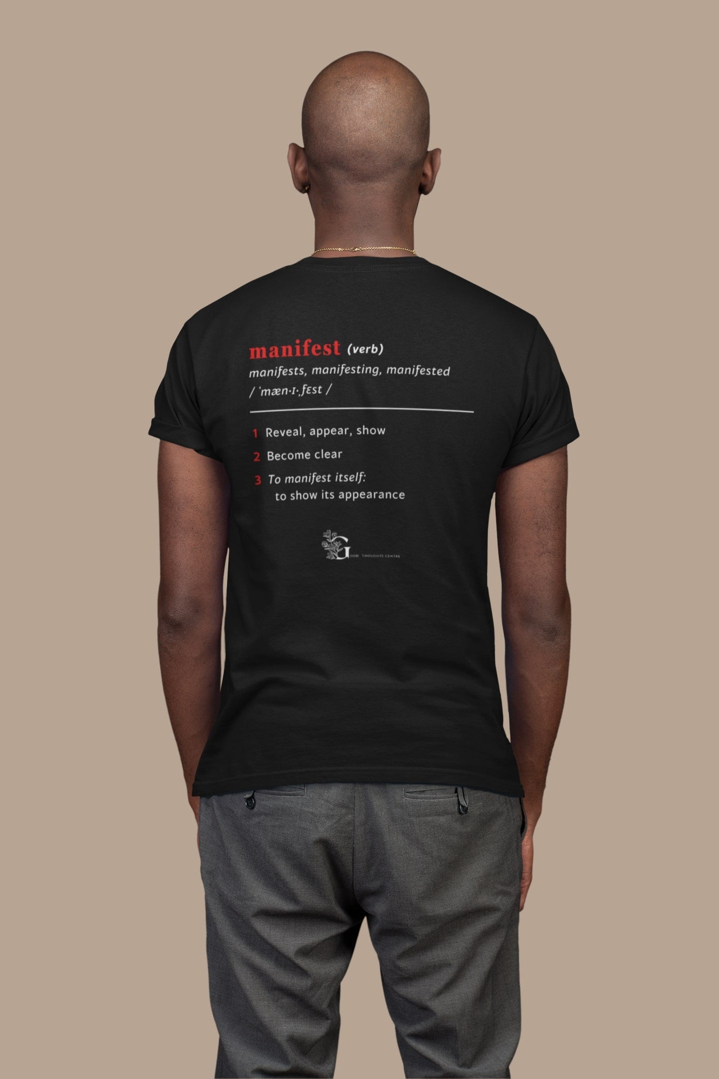 Good Thoughts Centre T-shirt - Achterzijde: Definitie van manifesteren (Engels) & logo. Kleur: Black